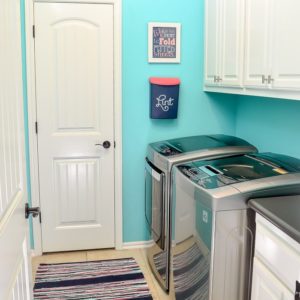 Bright & happy organized laundry room makeover - Under $100!